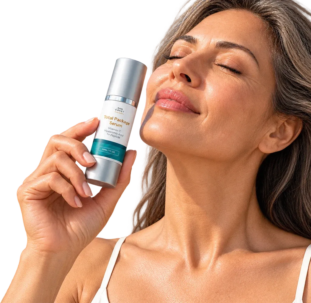 Woman holding the Total Package Serum to her cheek