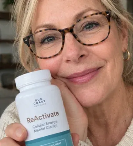 Customer holding her ReActivate bottle